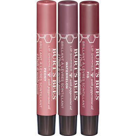 Burt's Bees Kissable Color Gift Set lifestyle scene with flowers