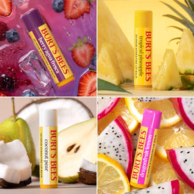 Burt's Bees Lip Balm tube in Dragonfruit Lemon flavour on a wooden surface