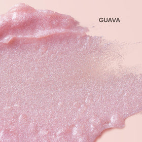 Burt's Bees Lip Shimmer Guava on a wooden surface