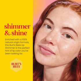 Burt's Bees Shimmer Lip Tint Set on a wooden table