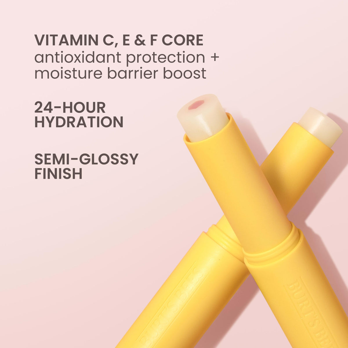 Burt's Bees support Lip Balm Sheer Plus on a wooden surface