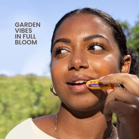 Burt's Bees Sweet Peach lip balm tube close-up