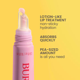 Burt's Bees Sweet Strawberry Lip Milk on a wooden table