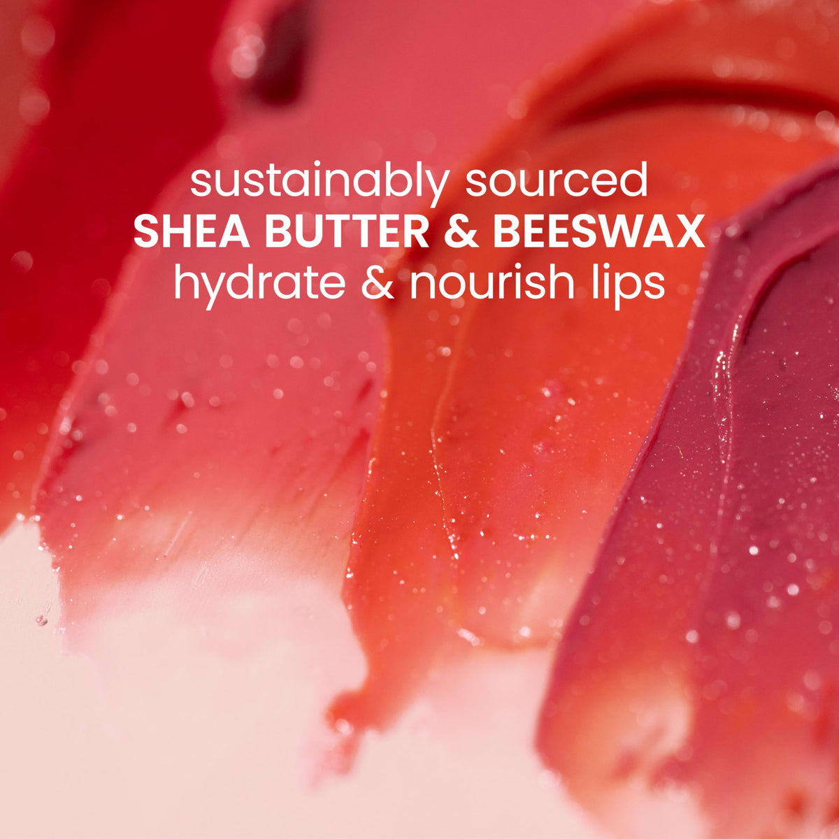 Burt's Bees Tinted Lip Balm tubes arranged on a flat surface