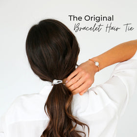 By Lilla Bracelet Hair Tie displayed with luxe packaging