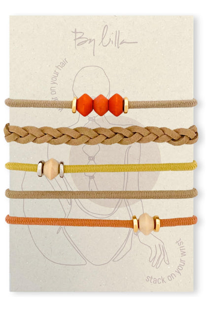 By Lilla Bracelet Hair Tie in limestone colour, front view