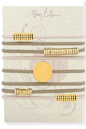By Lilla bracelet hair tie in sunlight with gold accents
