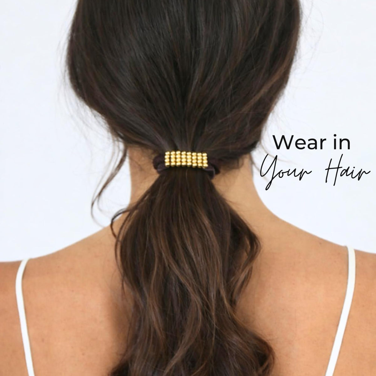 By Lilla Bracelet Hair Tie worn as a wrist bracelet