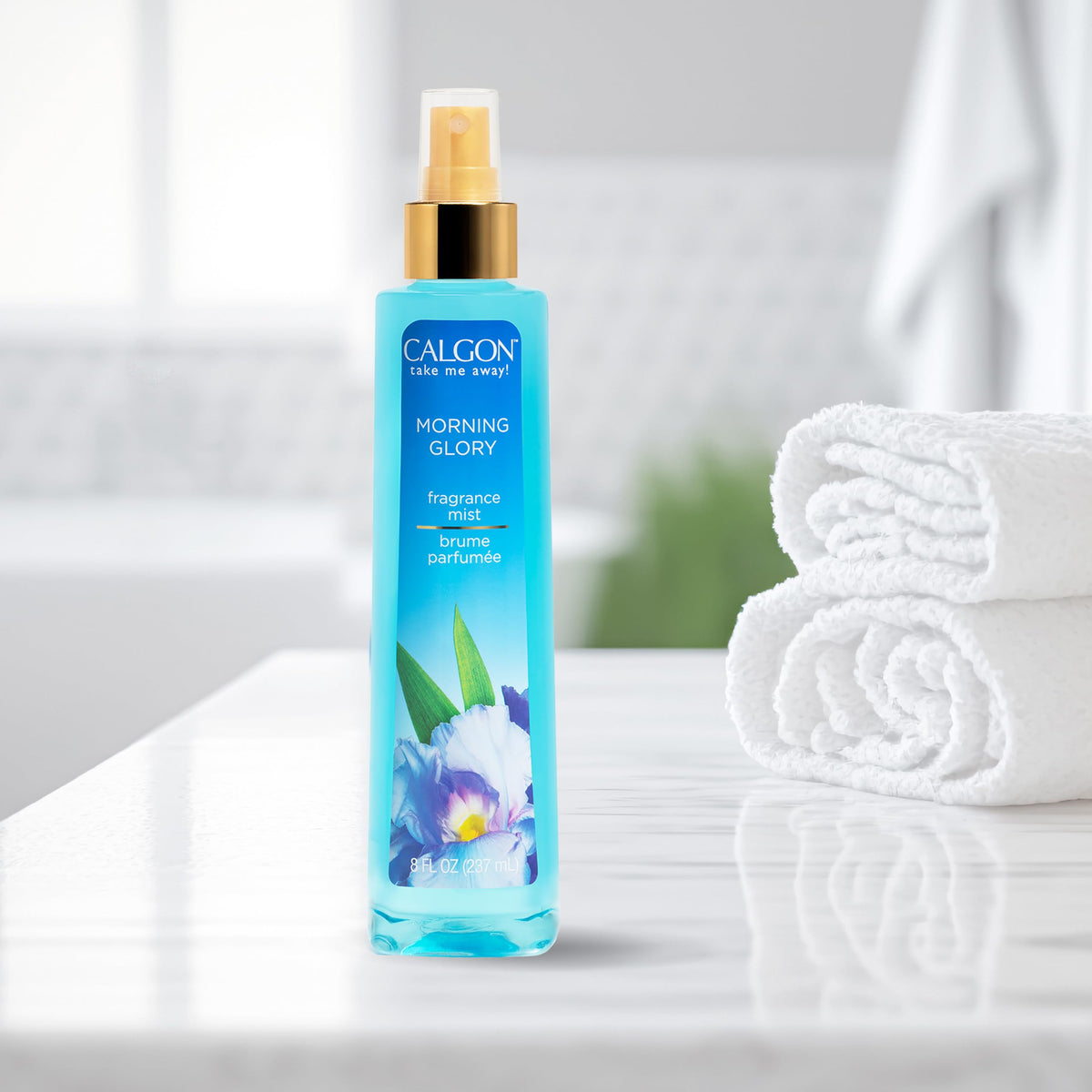 Calgon Morning Glory Body Mist 8 fl oz spritzing in the air