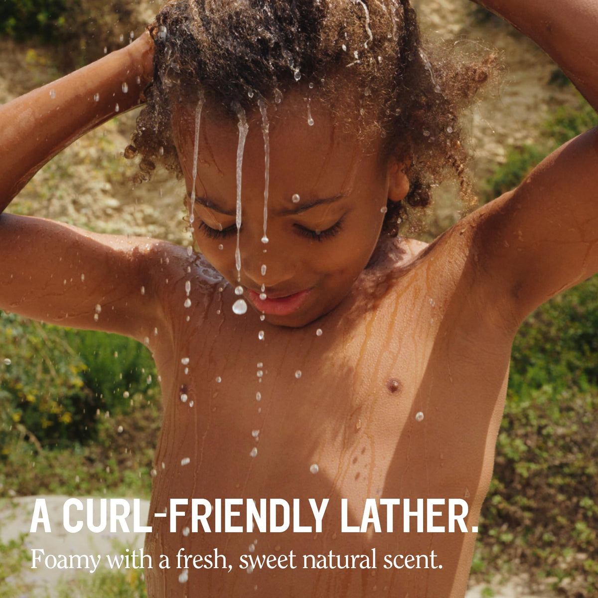 California Naturals Curly Kiddo Shampoo & Conditioner Set on a bathroom shelf