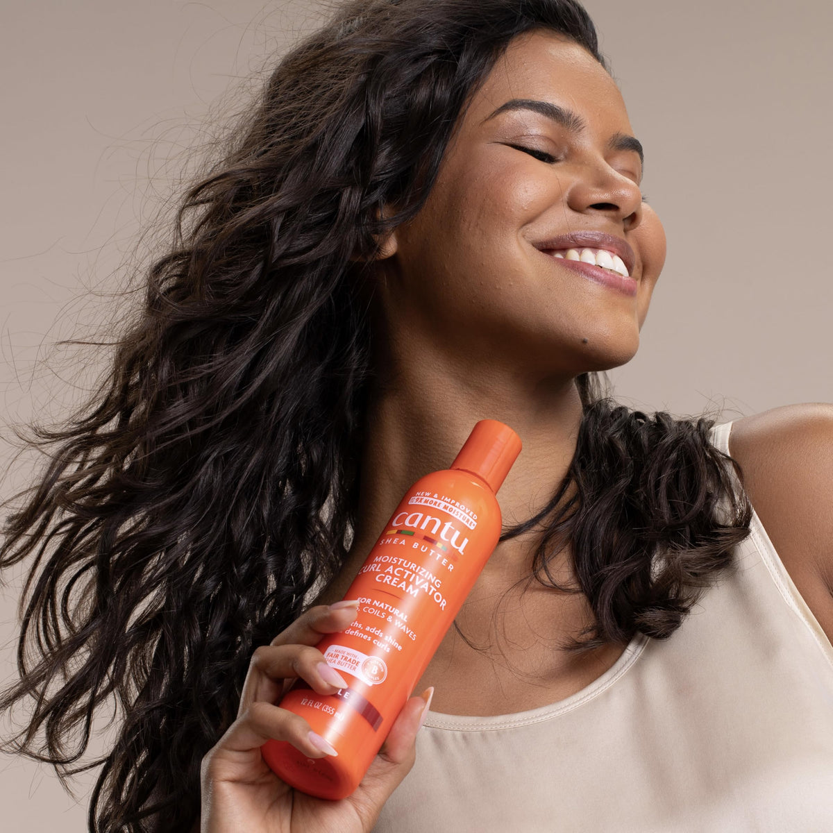 Cantu Curl Activator Cream application on natural curls