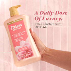 Caress Daily Silk Body Wash 30 fl oz with rich lather on skin