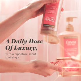 Caress Daily Silk Body Wash on a shower shelf