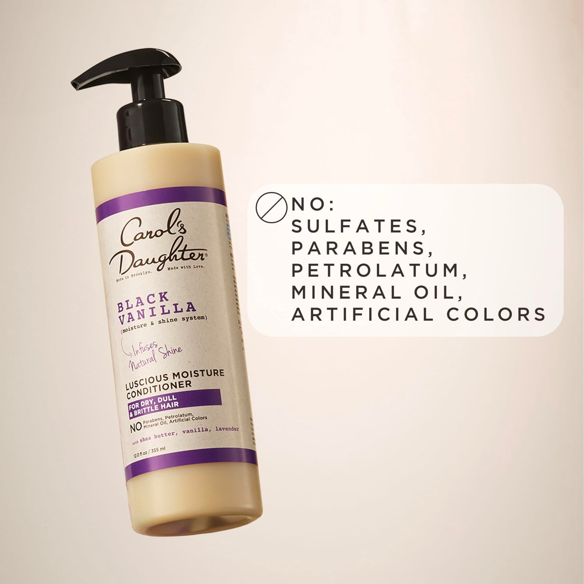 Carol's Daughter Black Vanilla Moisture Conditioner on a towel