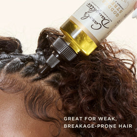 Carol's Daughter Goddess Strength 7 Oil Blend Scalp and Hair Oil side view
