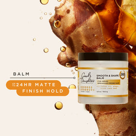 Carol's Daughter Goddess Strength Hair Balm on a styling table