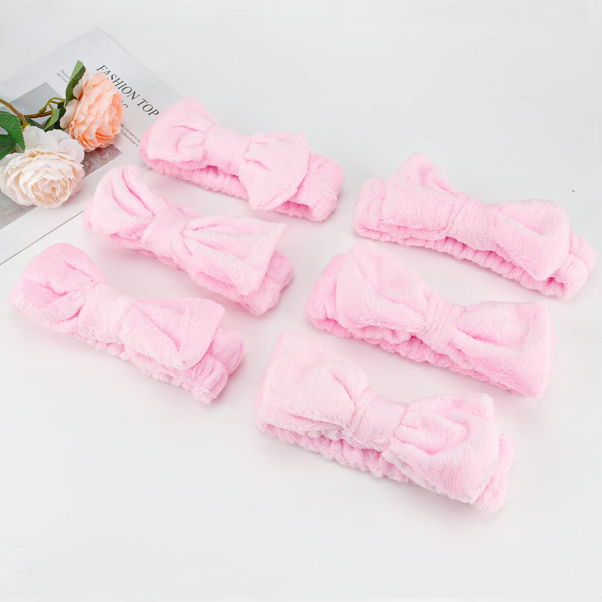 Casoty pink headbands in various angles and sizes