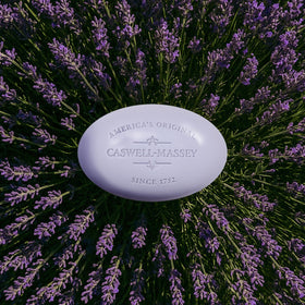 Caswell-Massey Lavender Bar Soap with lavender flowers