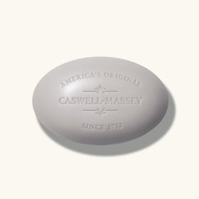Caswell-Massey LX48 soap beside grooming tools