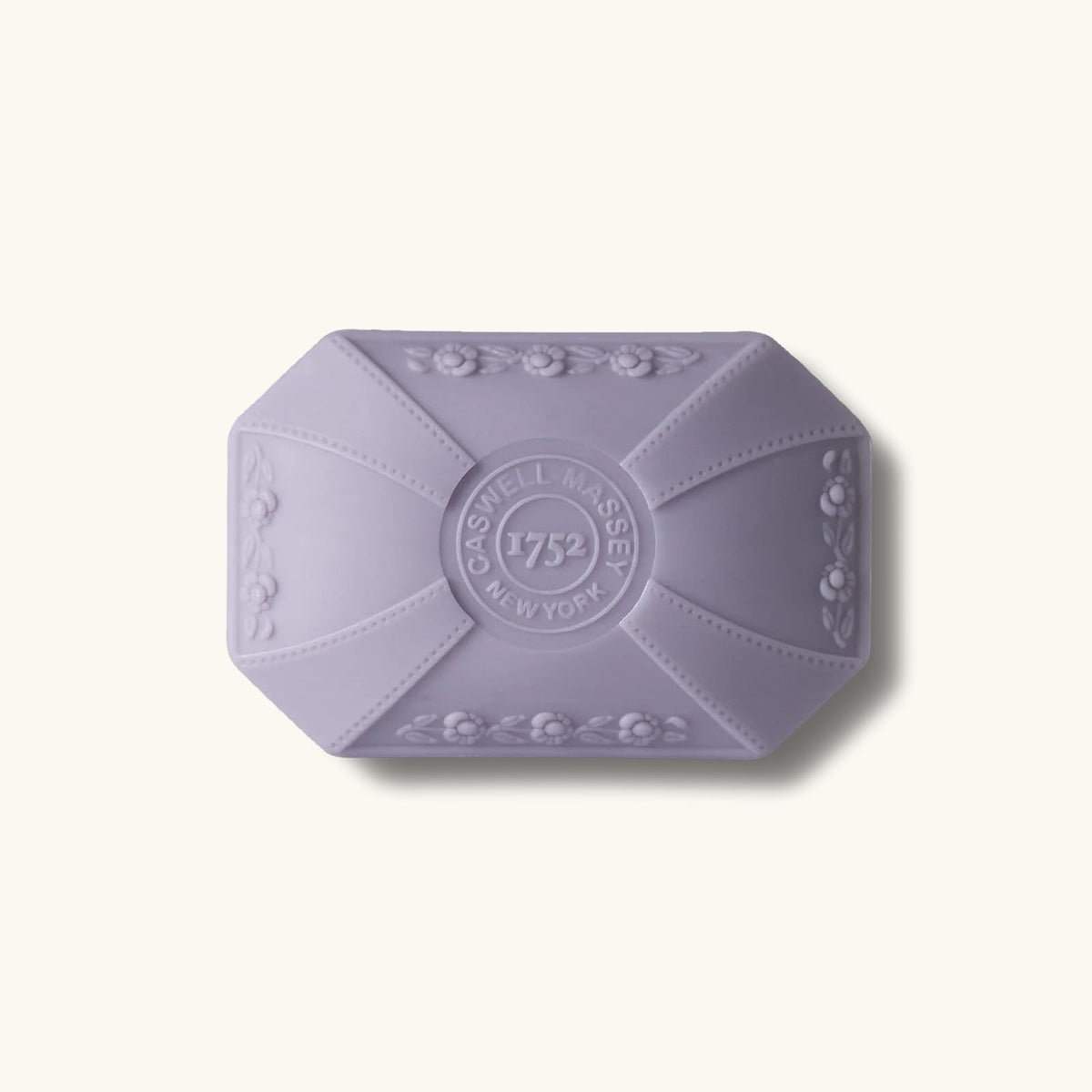 Caswell-Massey Orchid Soap displayed with fresh Nashi pear