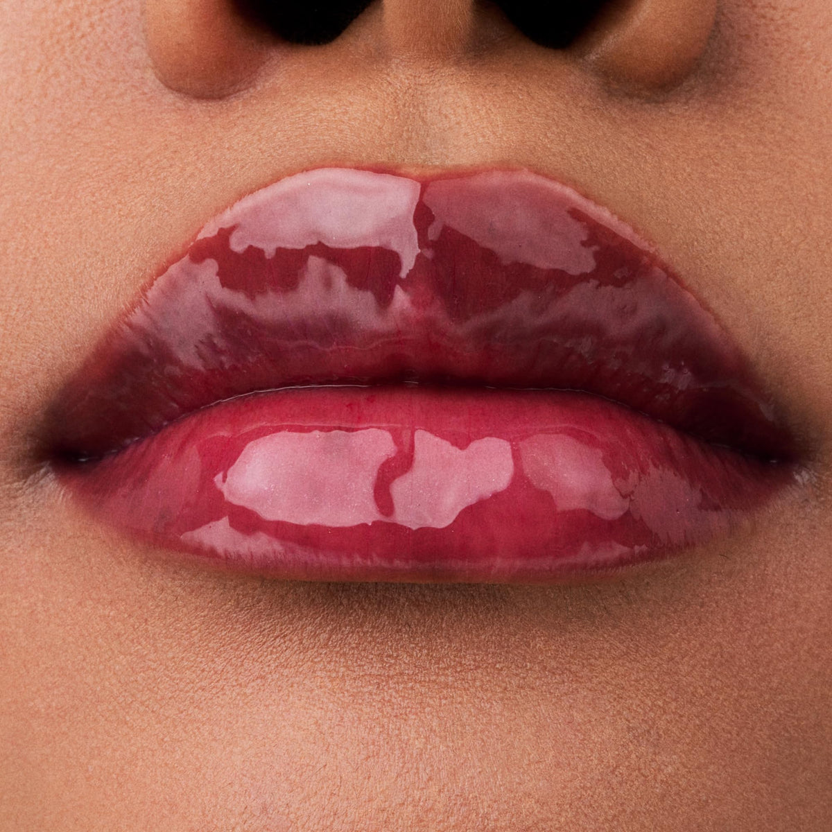Catrice Glossin’ Glow Tinted Lip Oil Keep It Juicy swatch on skin