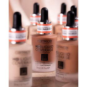 Catrice HD Liquid Coverage Foundation application with makeup brush
