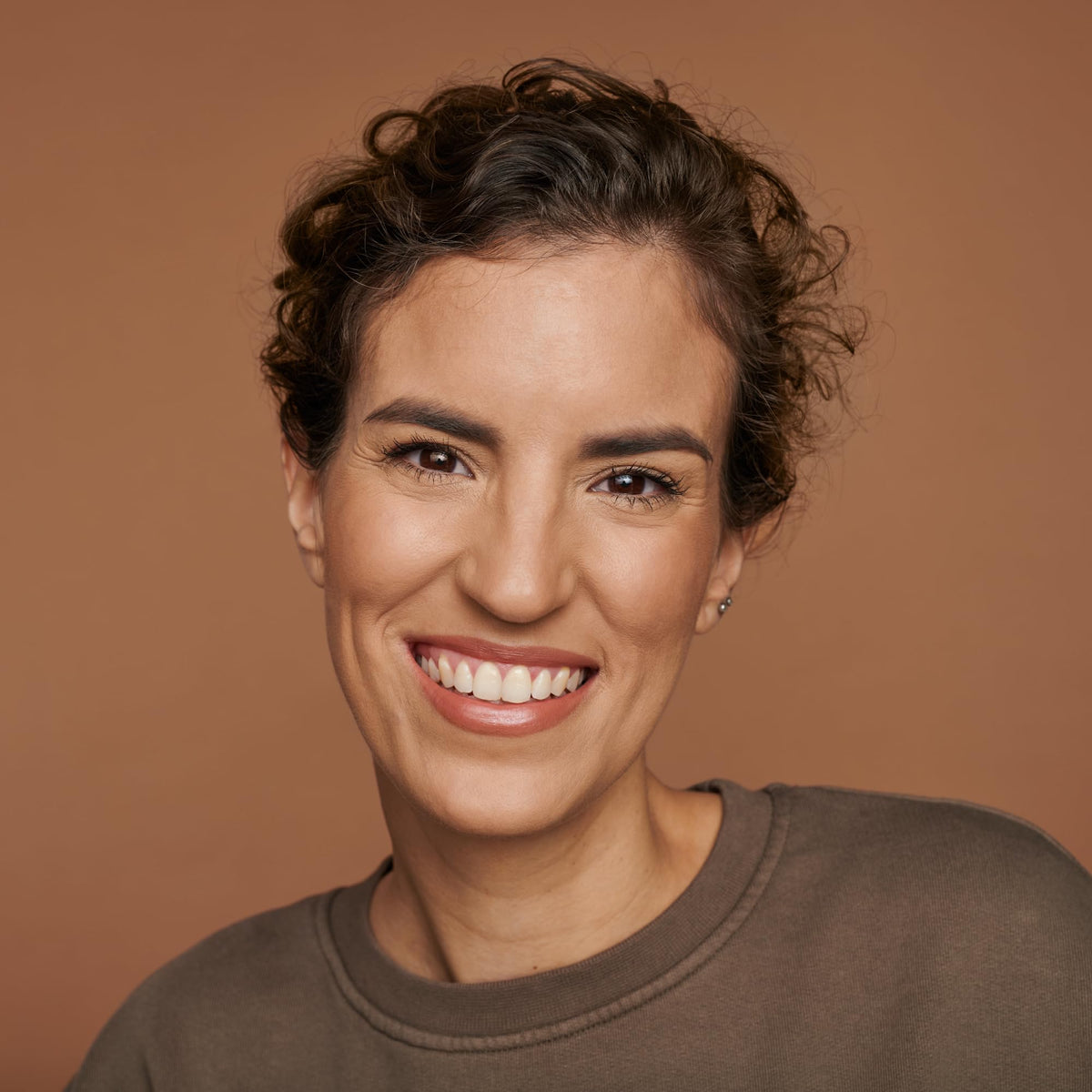 Catrice HD Liquid Coverage Foundation applied on model's face