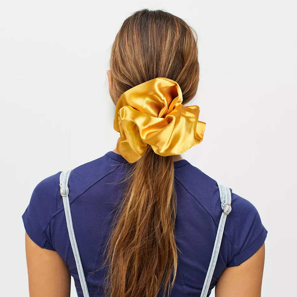 CEELGON blue satin scrunchie displayed on a table