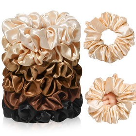 CEELGON jumbo satin scrunchies on a decorative background