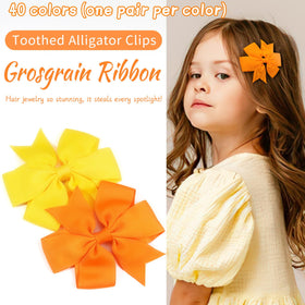 CÉLLOT 3 inch pinwheel bow in vibrant pink