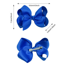 CÉLLOT alligator clip attached to a hair bow