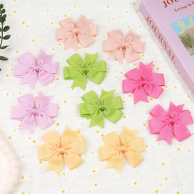 CÉLLOT hair bows in a gift presentation