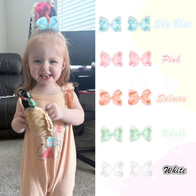 CÉLLOT hair bows in a variety of colours arranged