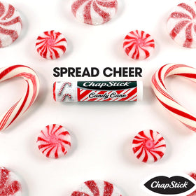 ChapStick Candy Cane Lip Balm next to holiday decorations