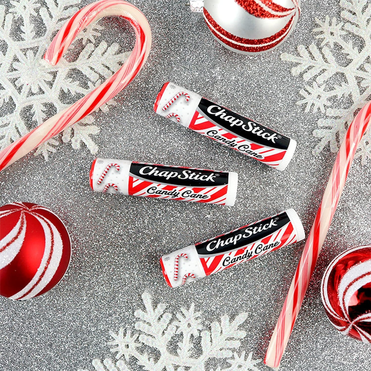 ChapStick Candy Cane Lip Balm tubes arranged in a row
