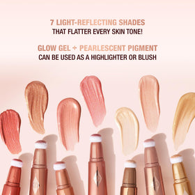 Charlotte Tilbury Beauty Light Wand Liquid Highlighter with other makeup products