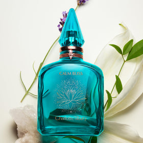 Charlotte Tilbury Calm Bliss Eau De Parfum with lavender flowers