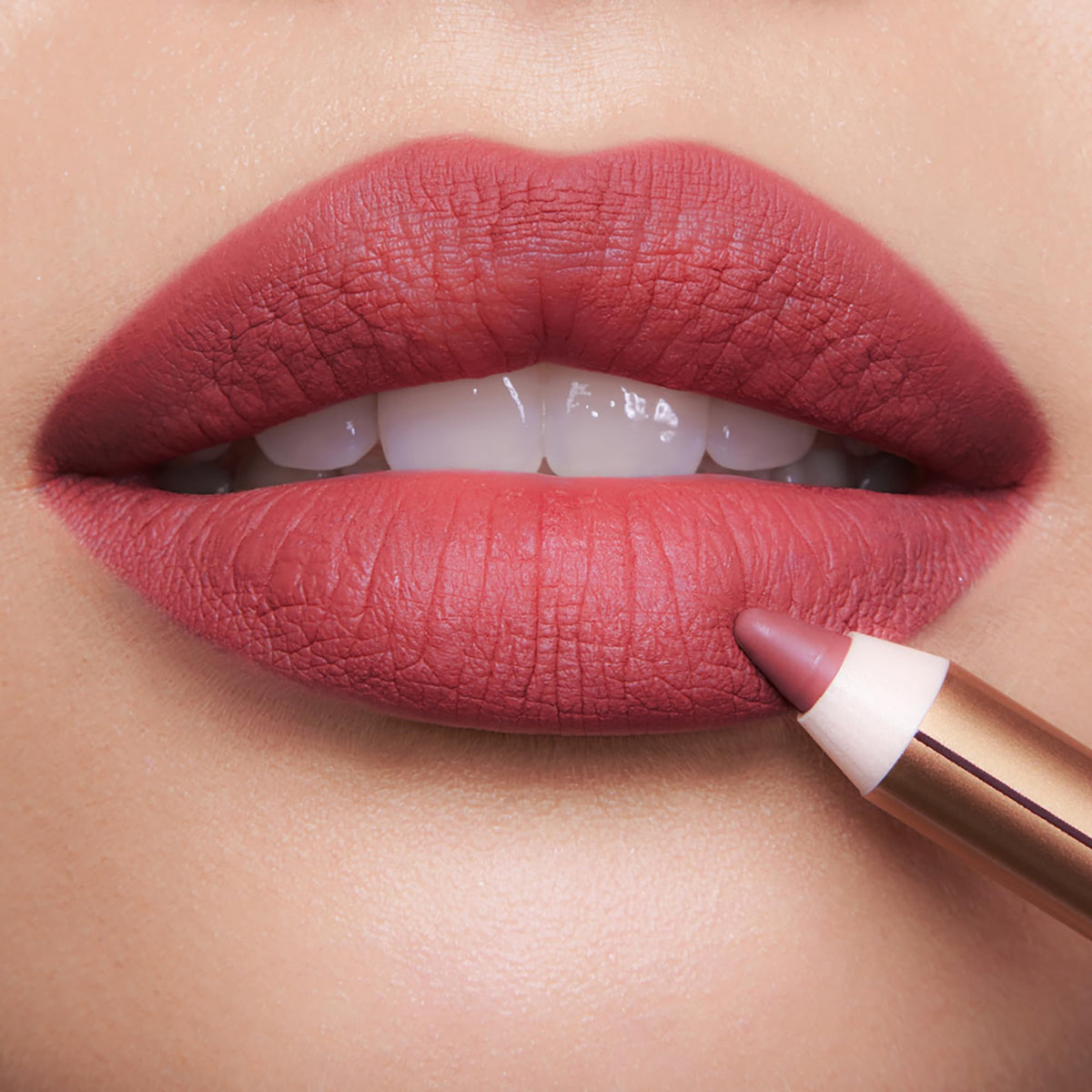 Charlotte Tilbury Lip Cheat Waterproof Lip Liner 90s Pink swatch on skin