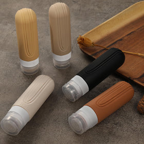 CHEODIN travel bottles displayed with travel accessories