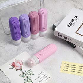 CHEODIN travel bottles packed neatly in a suitcase