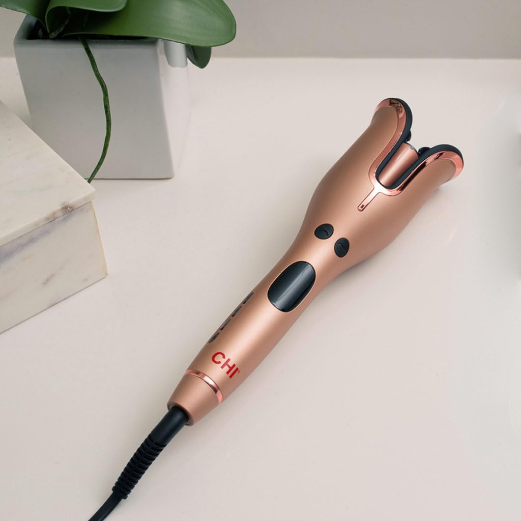 CHI Spin N Curl 1″ Ceramic Rotating Curling Iron with hair section inserted