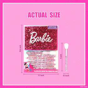 Child applying eyeshadow using Barbie makeup brush