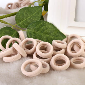 Child's hair styled with Qarwayoc blonde hair ties