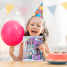 Child using Disney Frozen hair accessories set