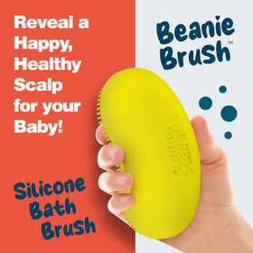 Child using Happy Cappy Beanie Brush during bath