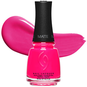 China Glaze Rose Among Thorns Neon Pink Nail Lacquer on a table