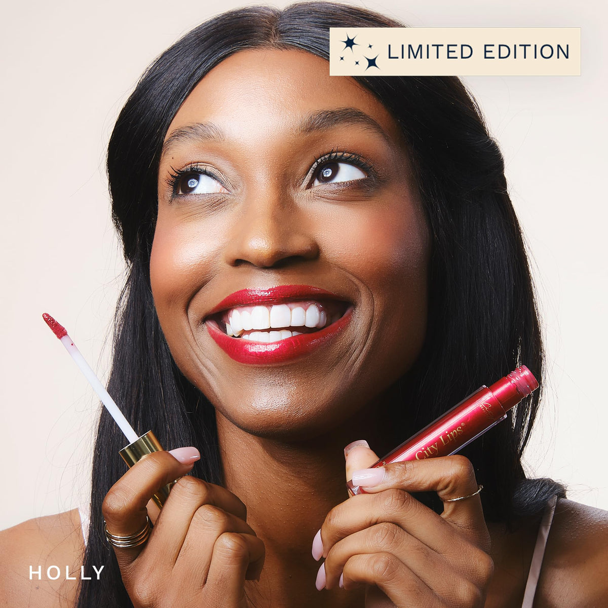 City Beauty City Lips Plumping Lip Gloss Holly in hand
