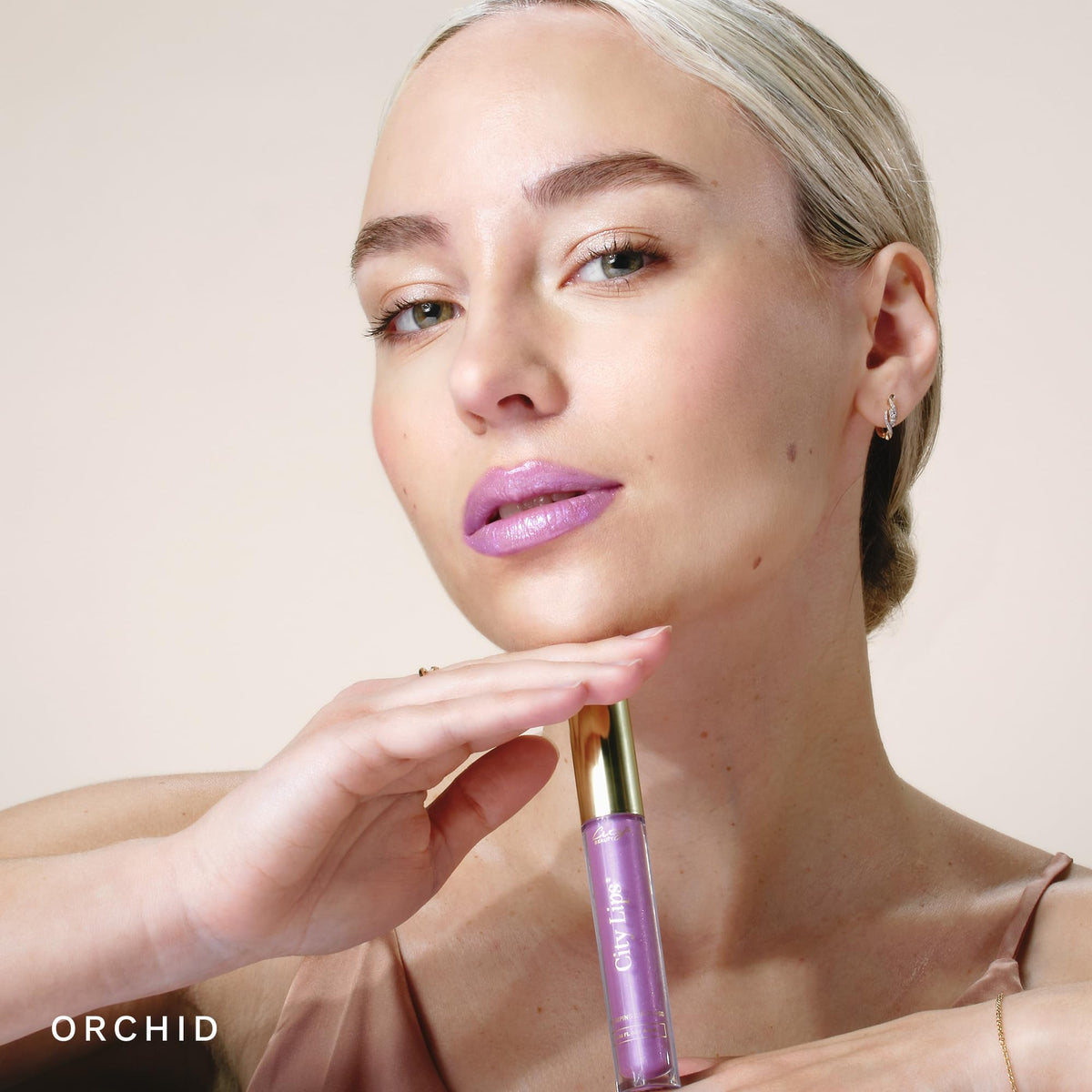 City Beauty City Lips Plumping Lip Gloss Orchid texture close-up