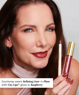 City Beauty City Lips Plumping Lip Gloss Raspberry on vanity