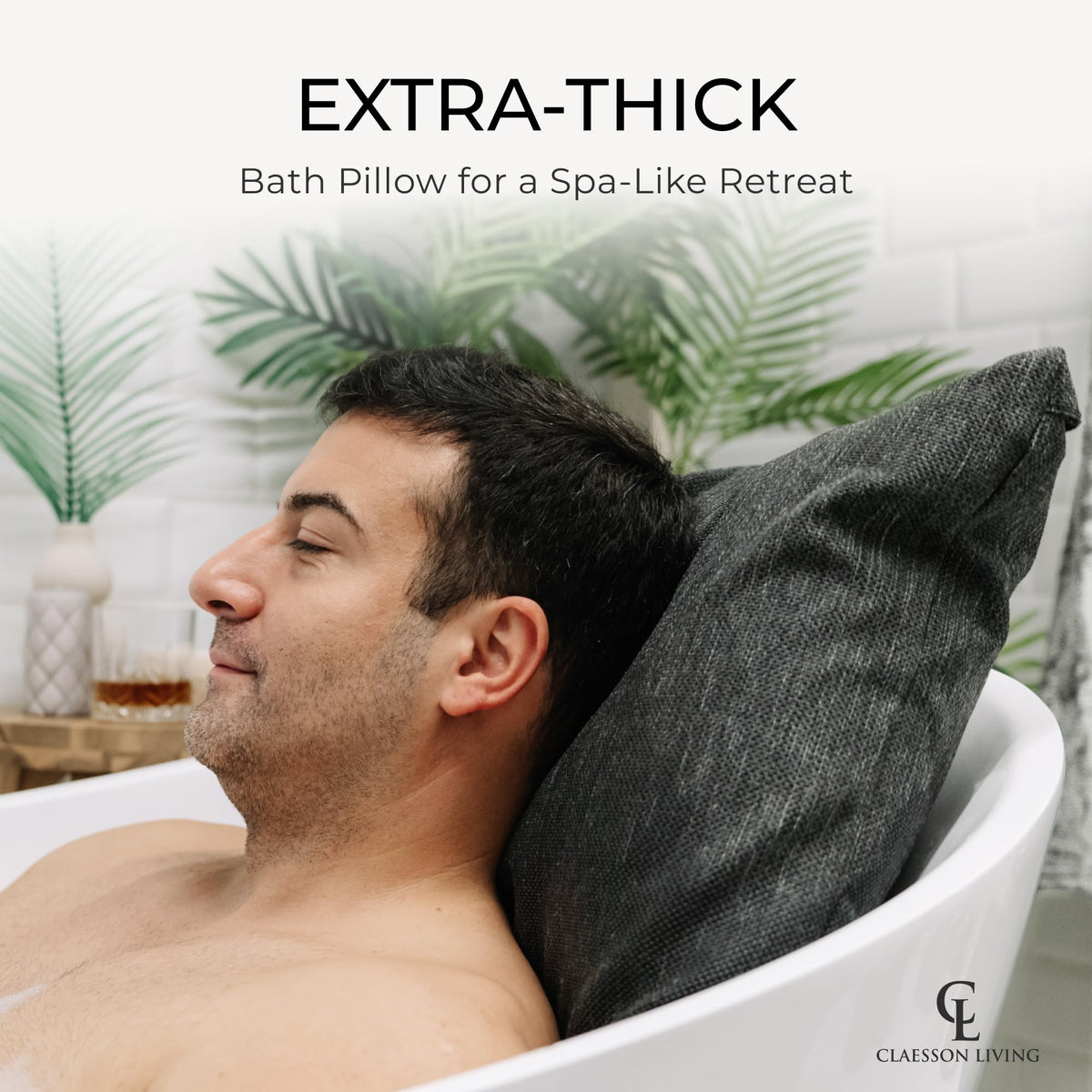 Claessonliving Luxury Bath Pillow on a poolside lounge